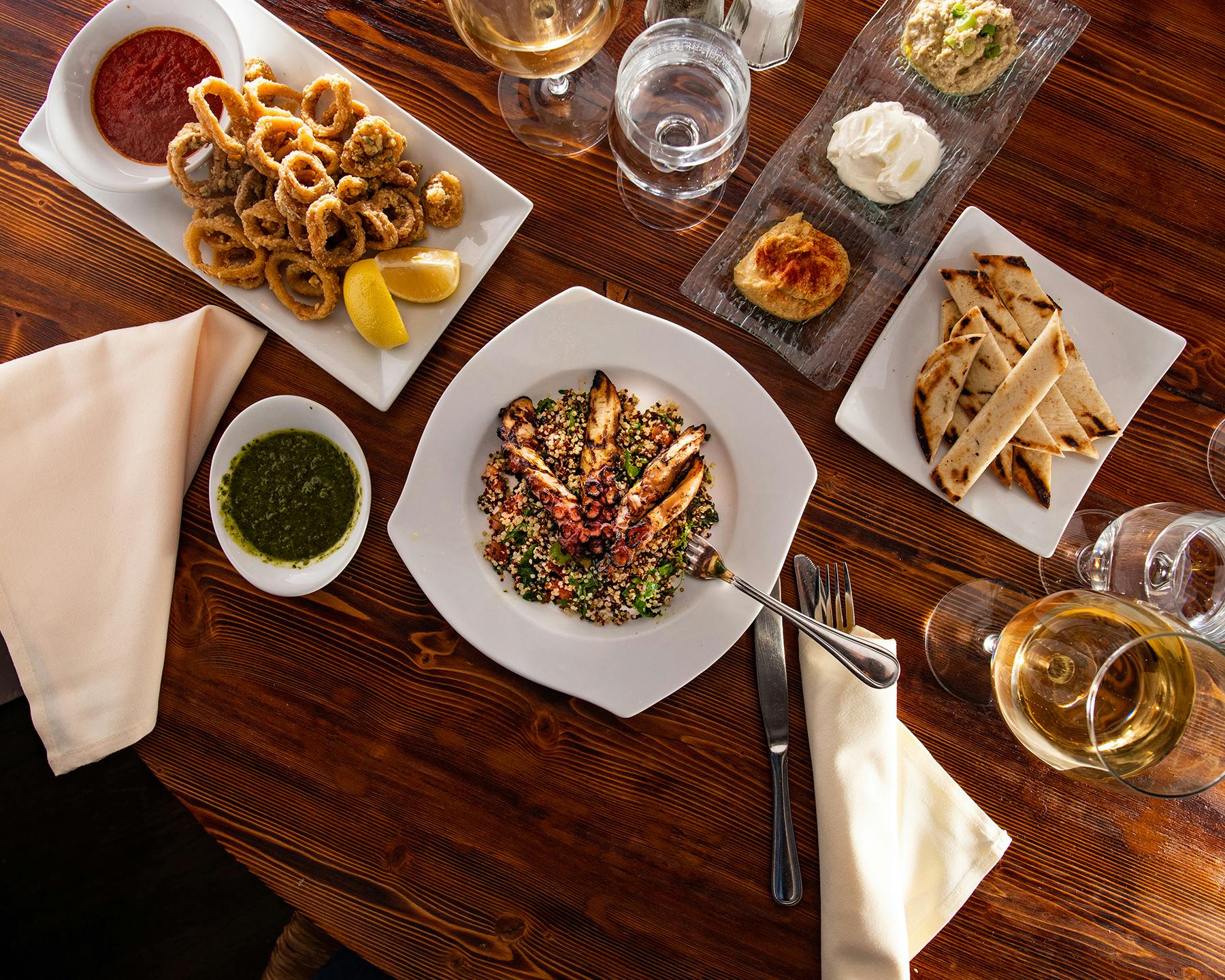 a table topped with plates of food on a plate