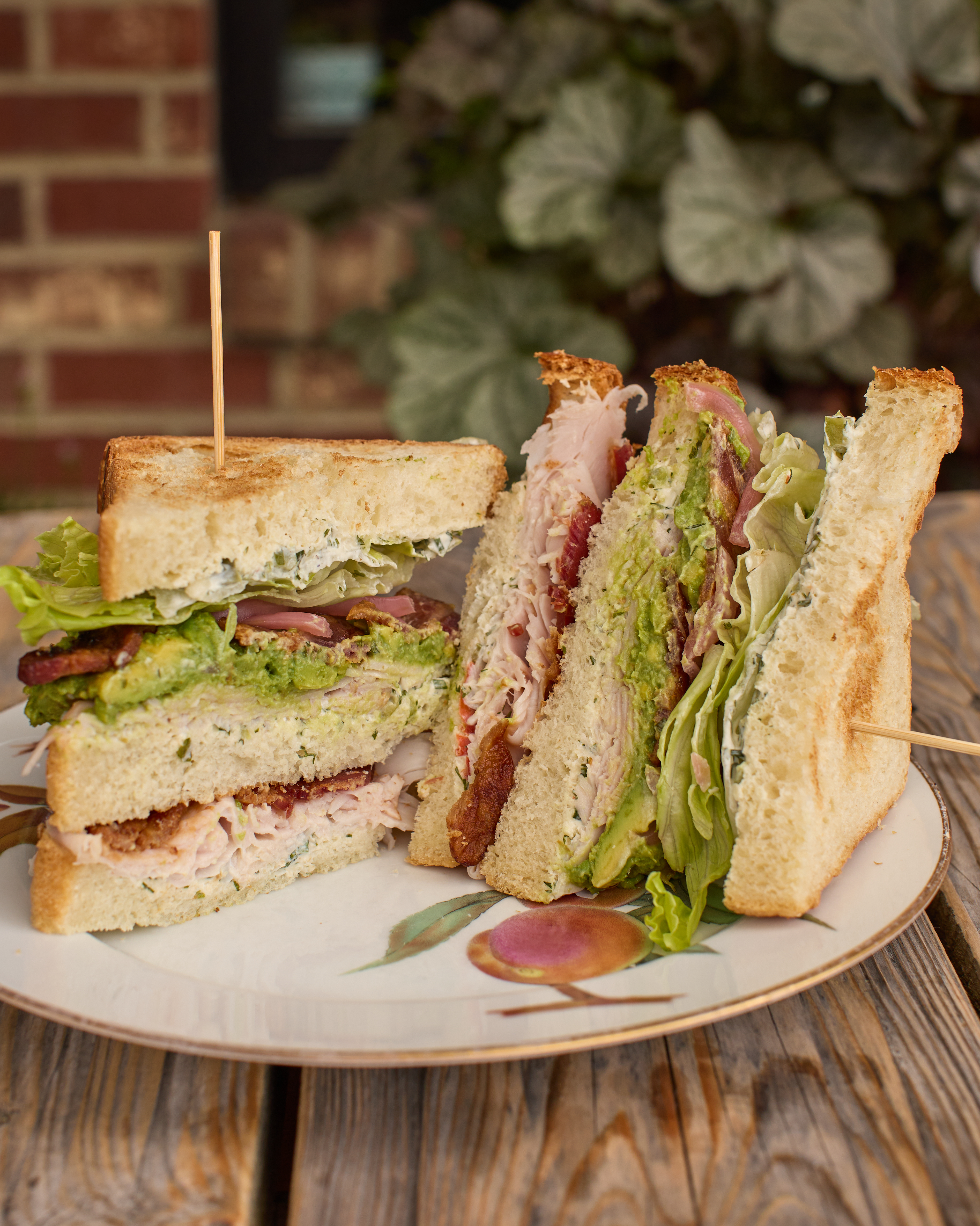 a sandwich cut in half on a plate