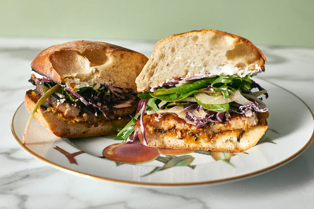 a sandwich cut in half on a plate