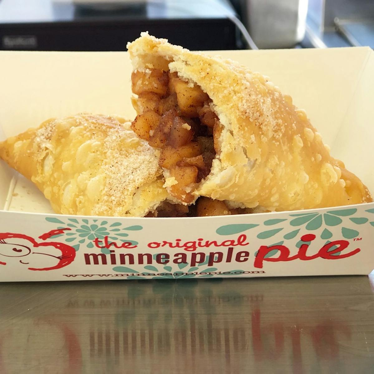 deep fried pie on a plate sitting on a counter