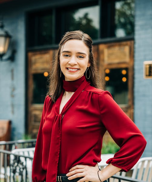 a person standing in front of a building