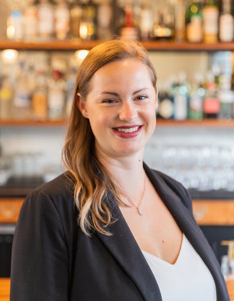 a woman smiling for the camera