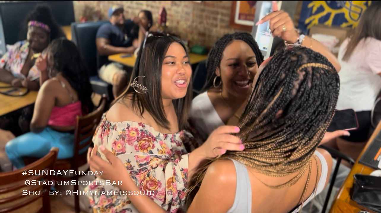 a person standing in front of a crowd