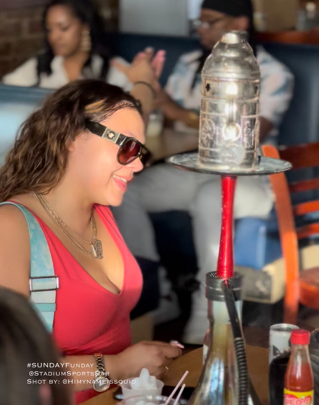 a woman sitting on a table