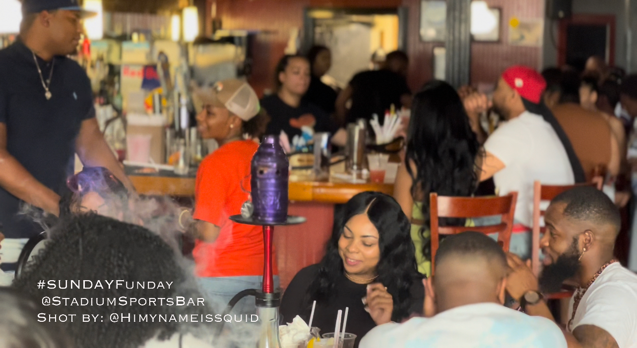 a group of people sitting at a table