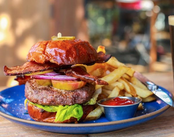 a sandwich on a blue plate