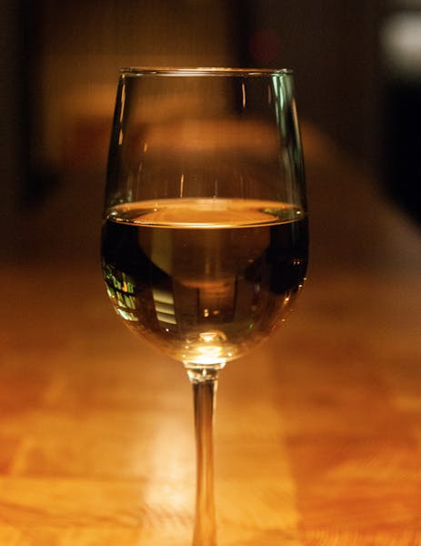 a close up of a wine glass