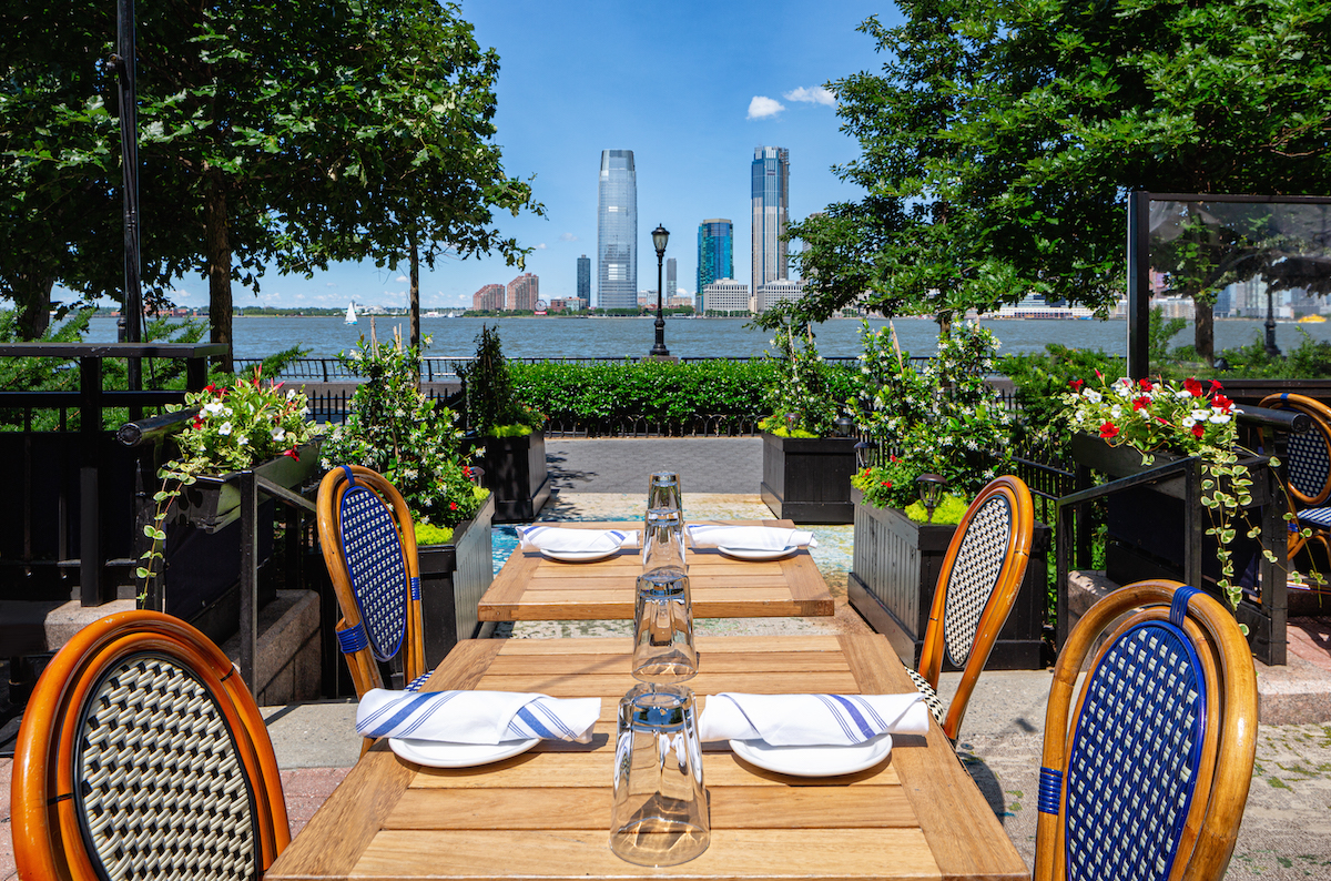 A table set for dining on Mezze on the River's waterfront terrace