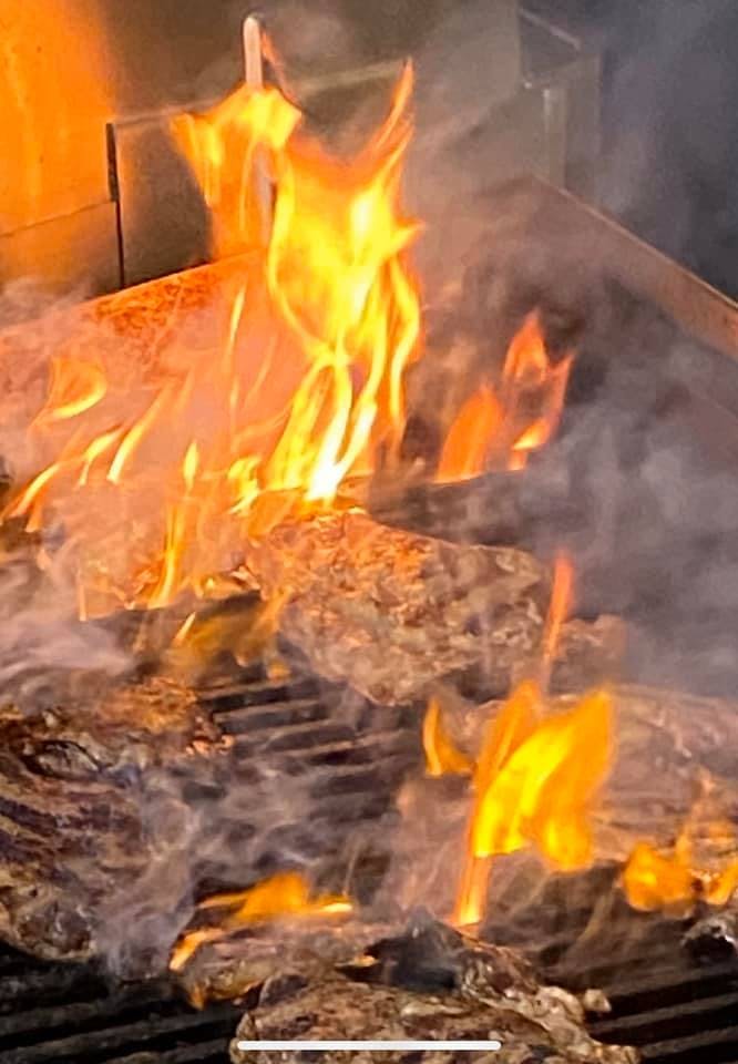 a fire on the grill