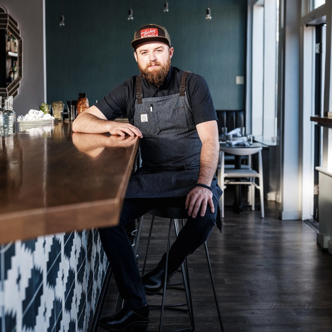 a man sitting on a table