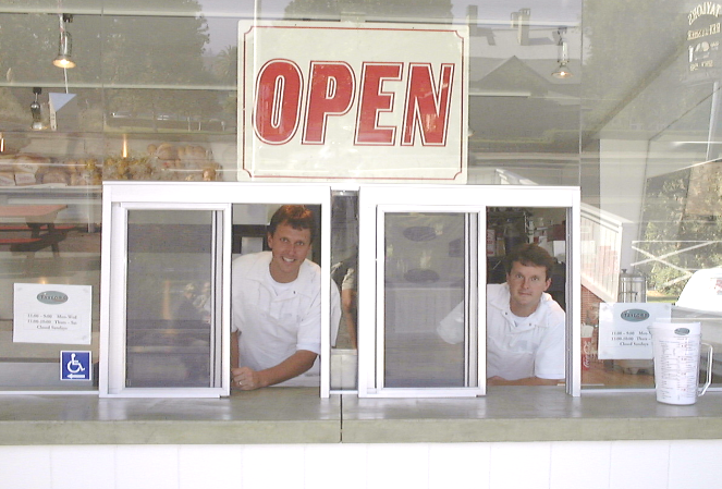 Joel and Duncan Gott looking through order window