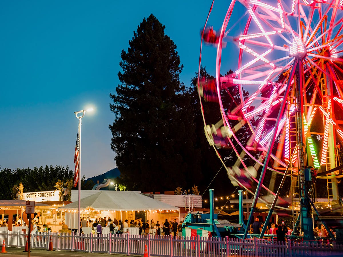 a tray of food on a bed