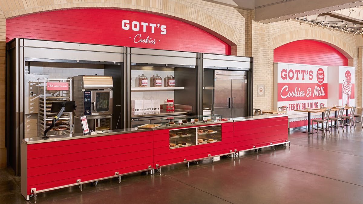 panoramic shot of red cookie counter and seating area at Gott's at the Ferry Building
