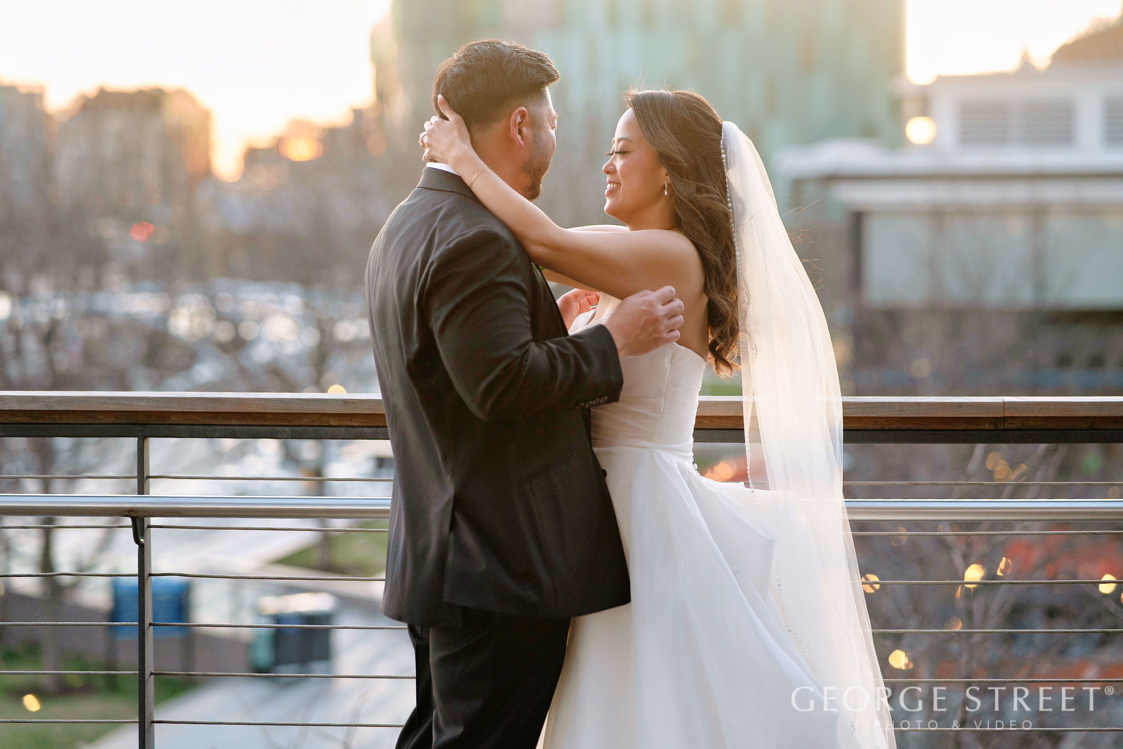 a man and woman in wedding attire hugging