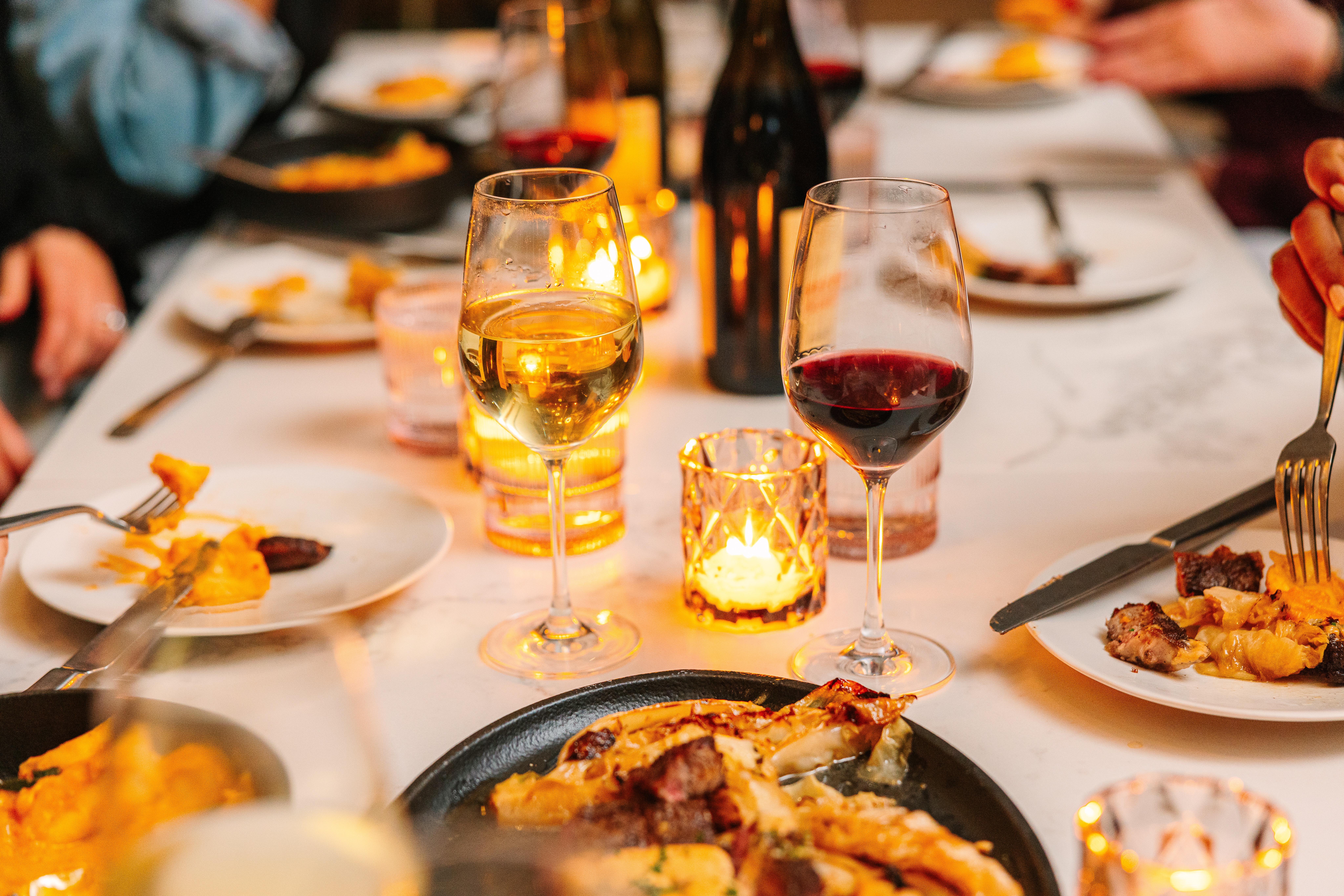 a candlelit dinner in the restaurant with wine