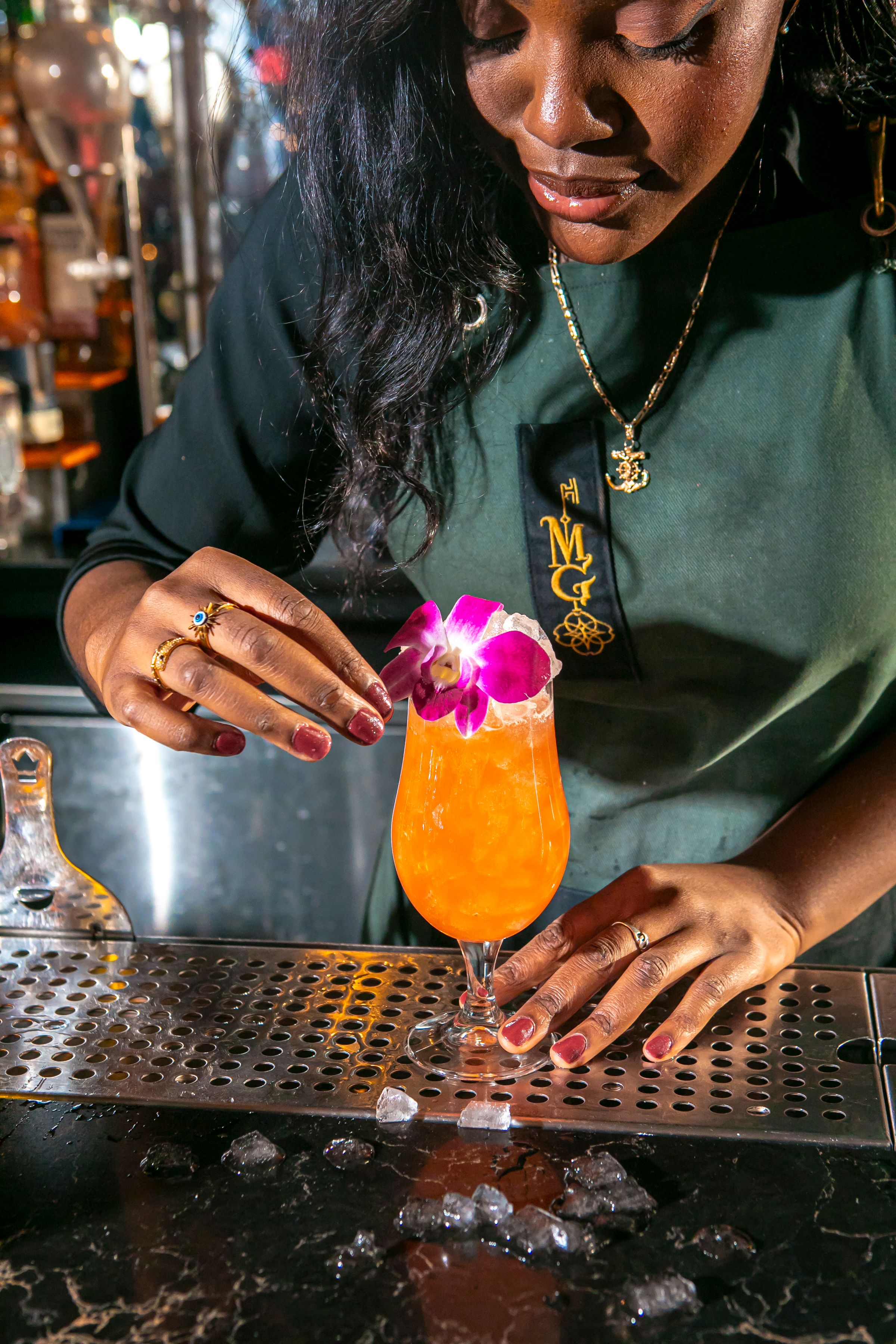 a woman holding a hot dog