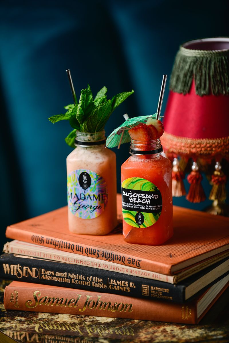 a stack of flyers on a table