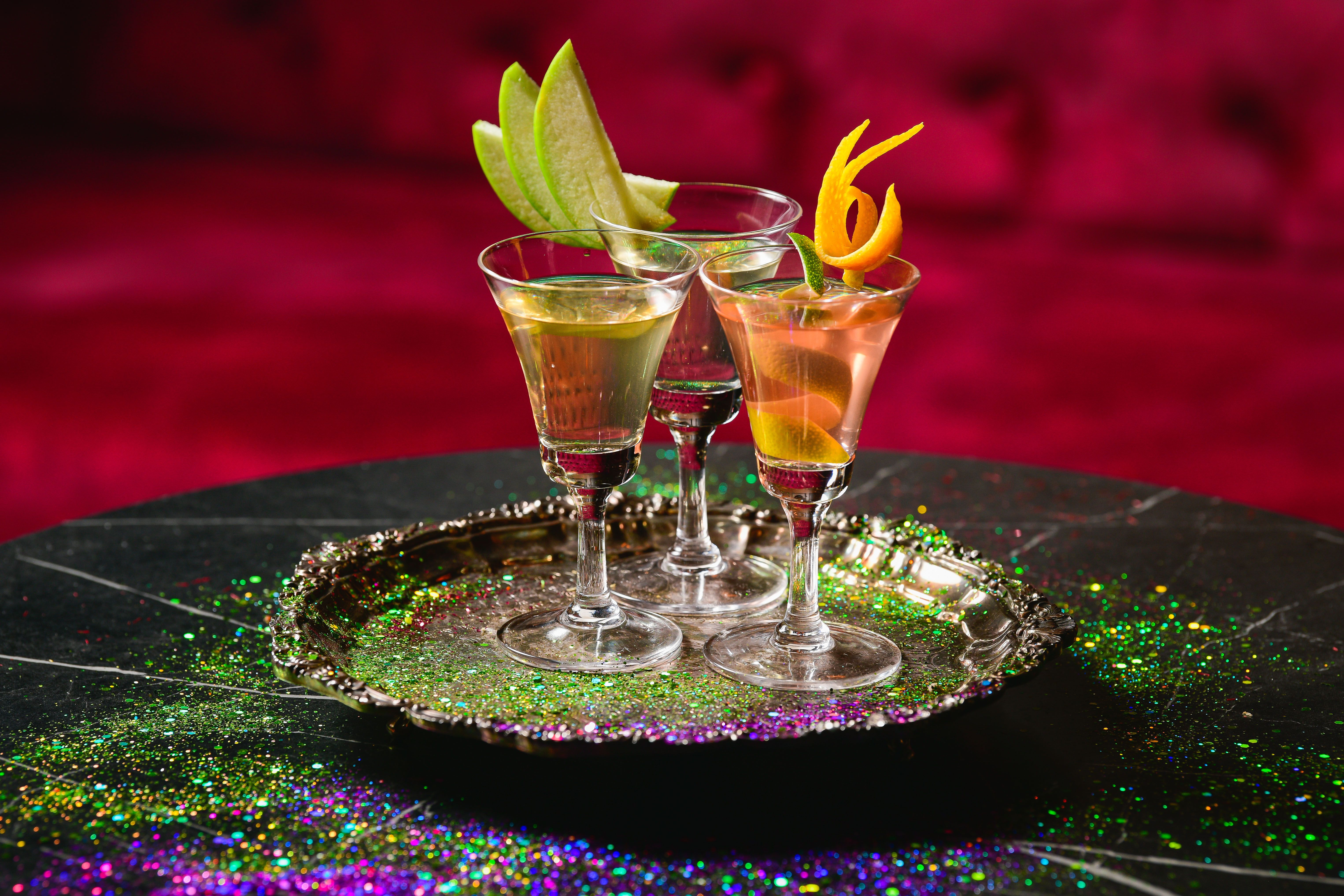 a close up of a wine glass sitting on a table