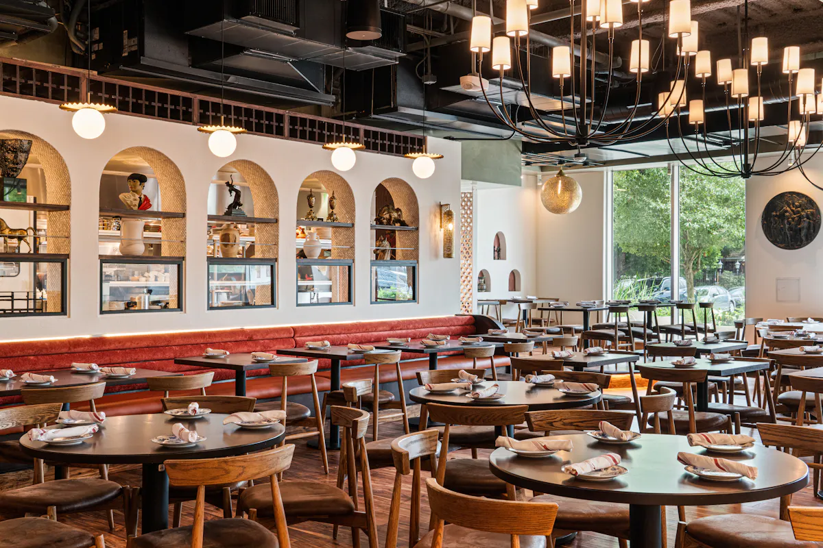 a restaurant with tables and chairs
