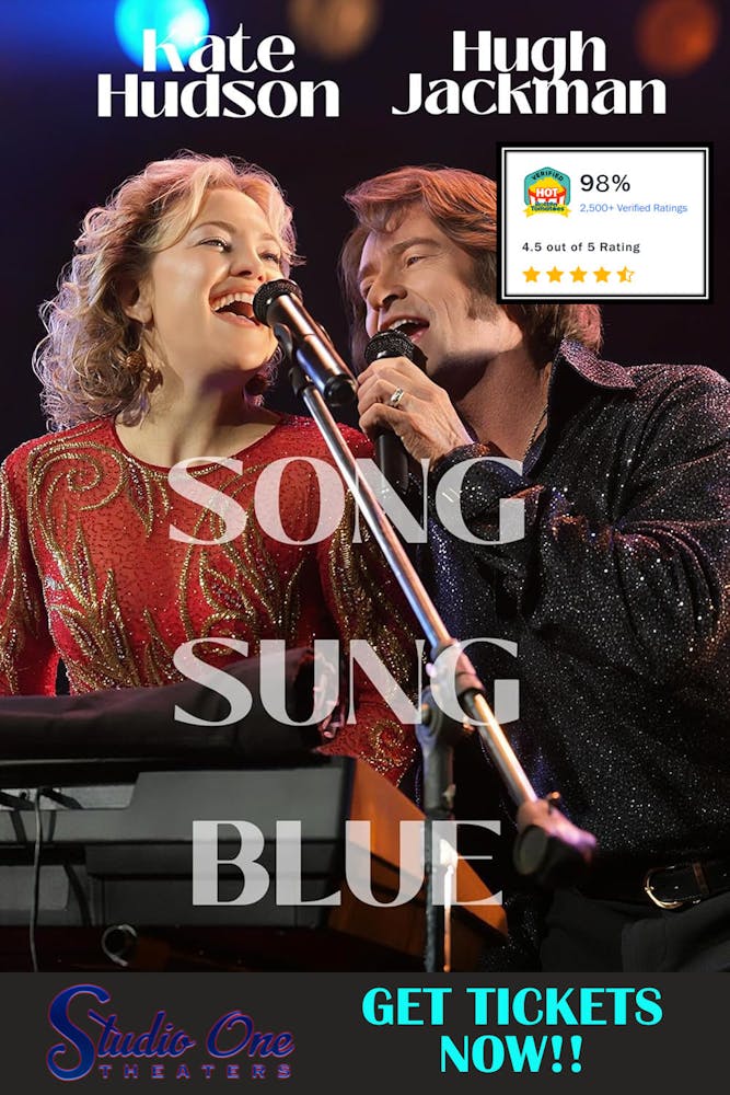 a close up of a person playing a guitar