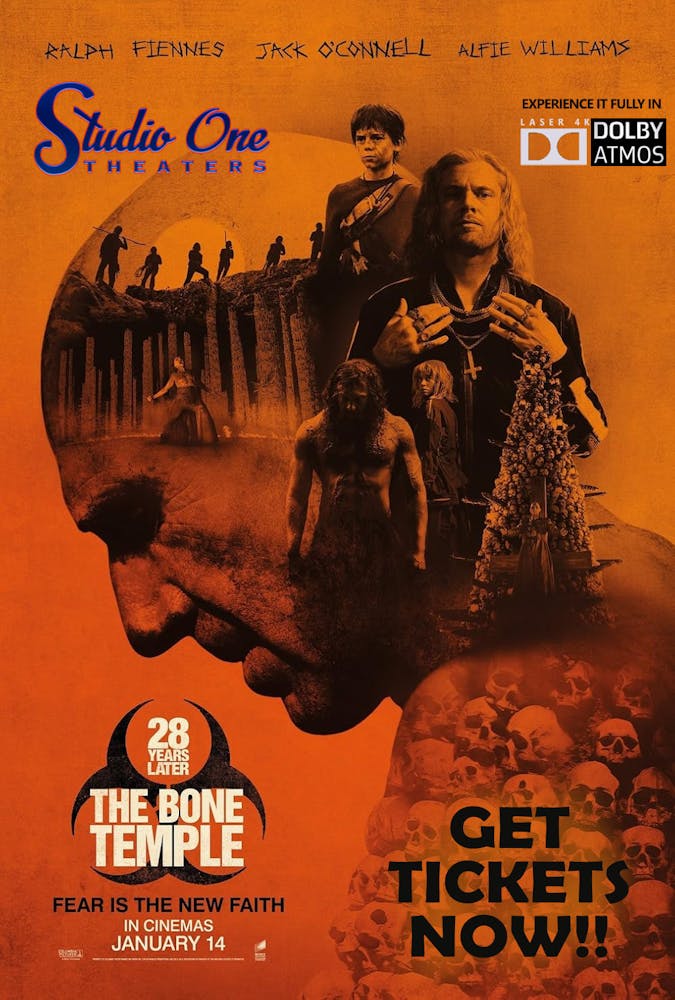 a group of people looking at a book