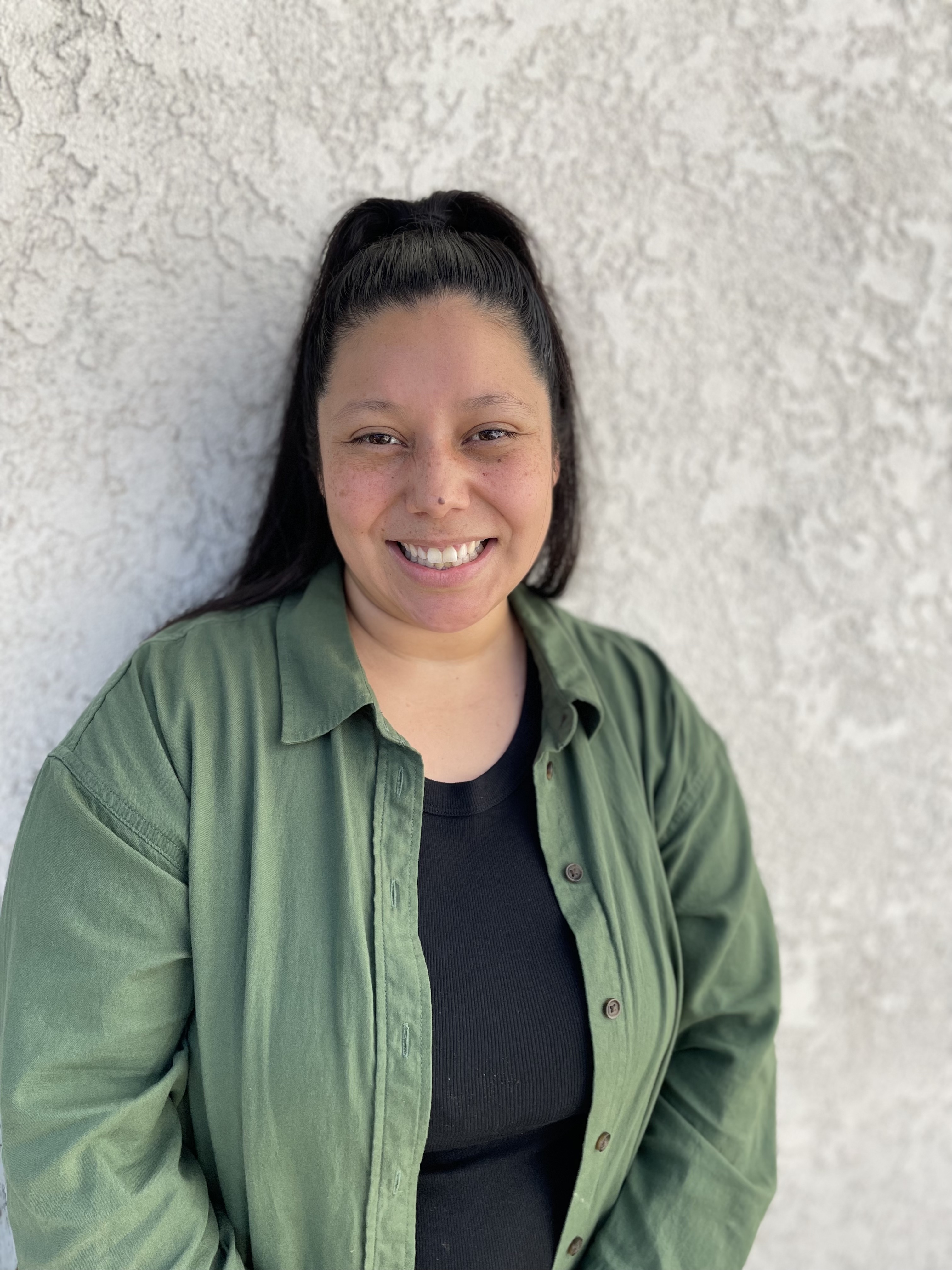 a person in a green shirt