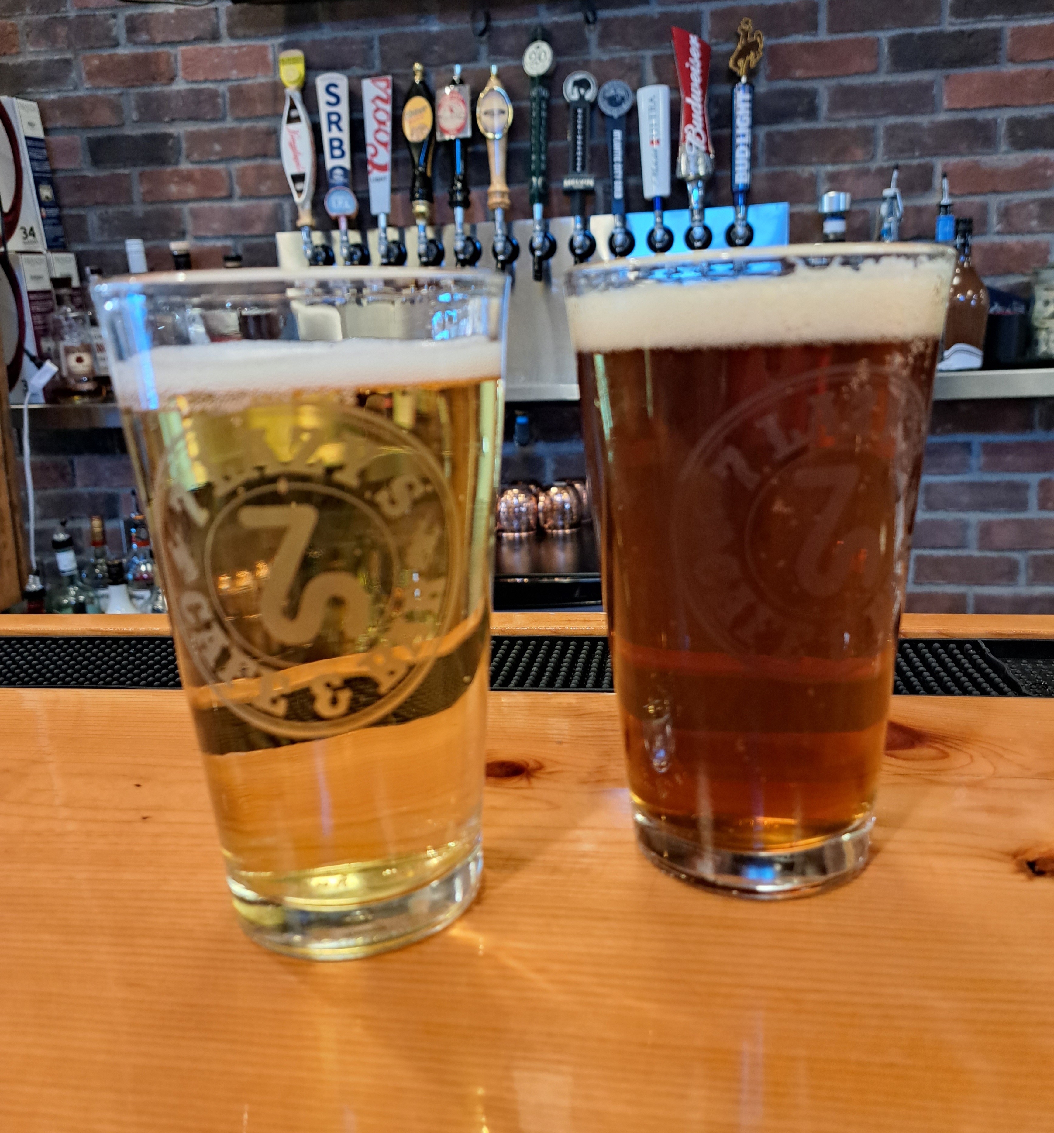a glass of beer on a table