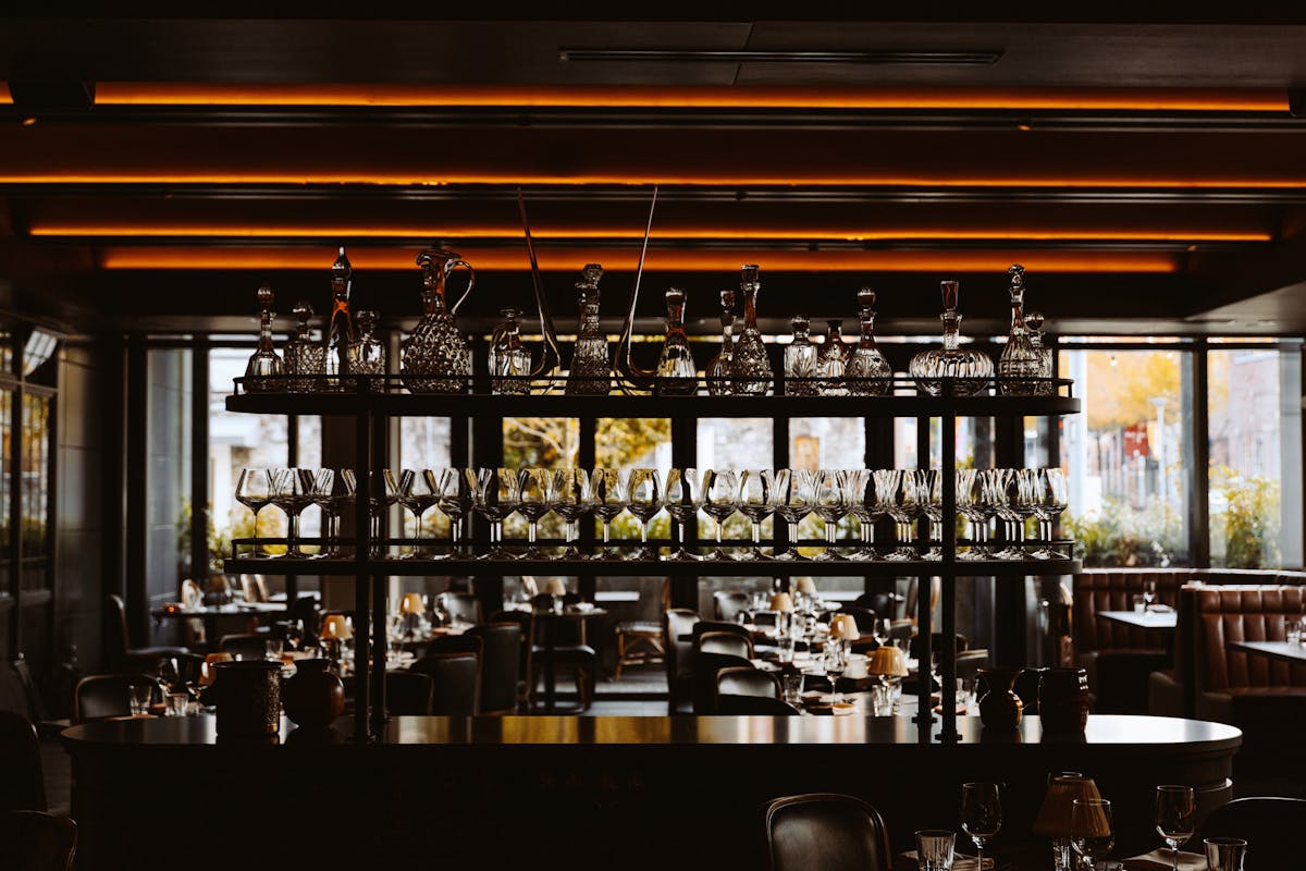 a dining room table in front of a window