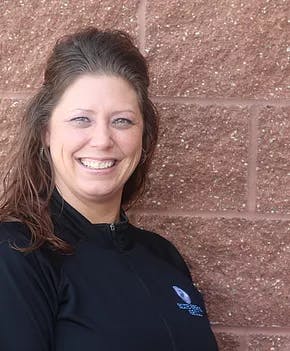 a woman smiling for the camera