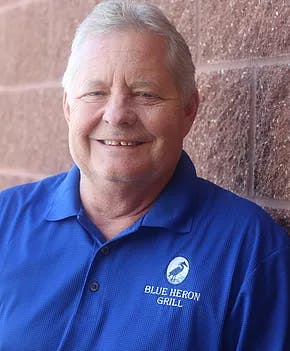 a man wearing a blue shirt