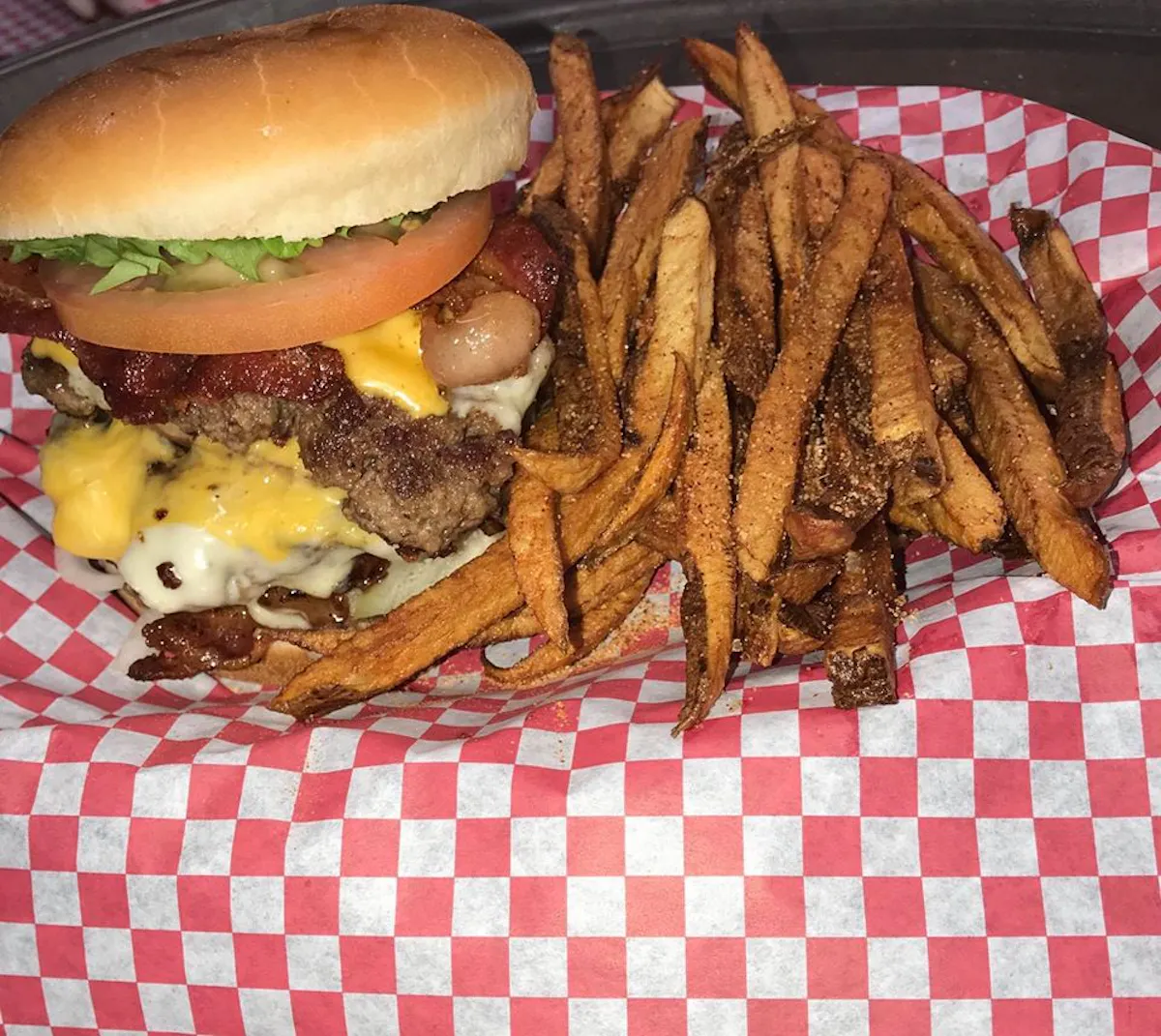 a burger with fries