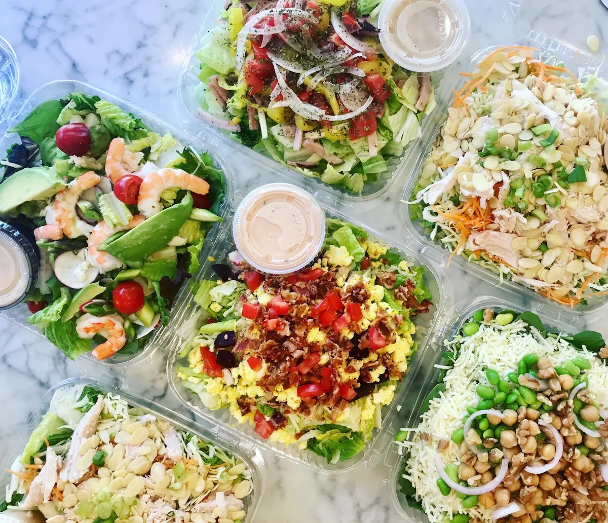 a dish is filled with different types of food on a table