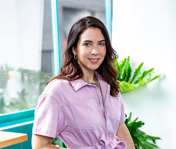 a woman smiling for the camera