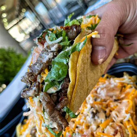 Top asada taco takeout and delivery near Rose Park, Long Beach CA provided by Blue Burro.