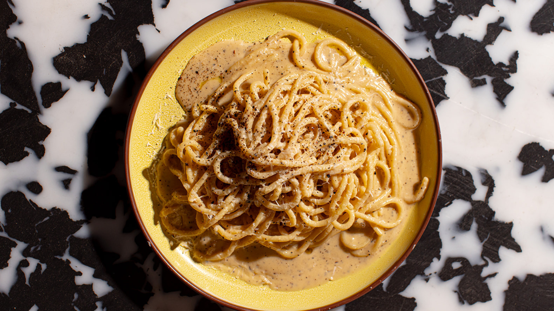 a plate of spaghetti with sauce