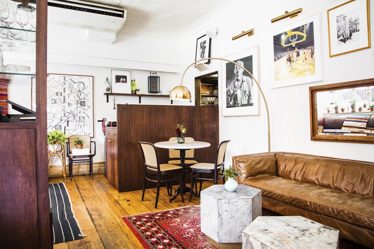 a living room filled with furniture and a fire place