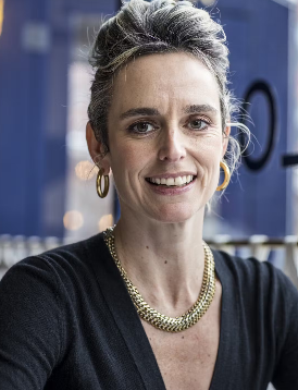 a woman smiling for the camera