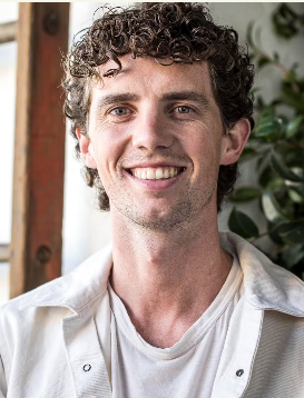 a man smiling for the camera