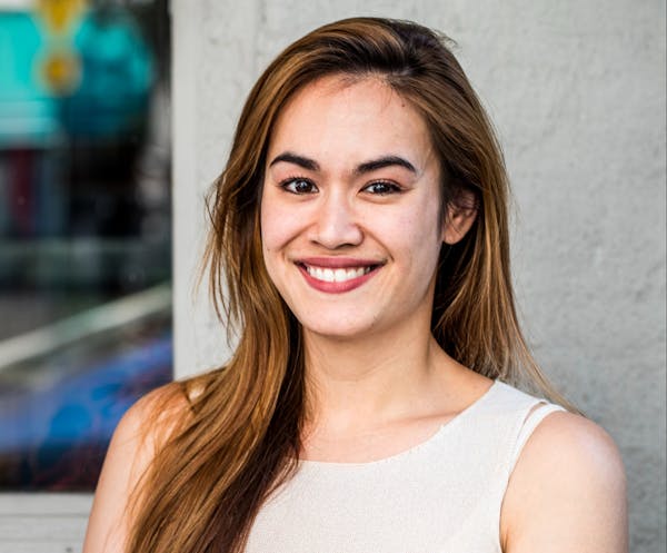 a woman smiling for the camera