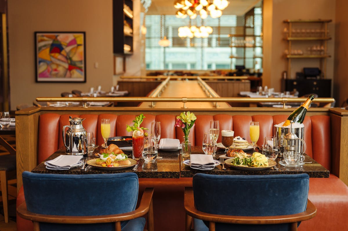 a kitchen with a table in a restaurant