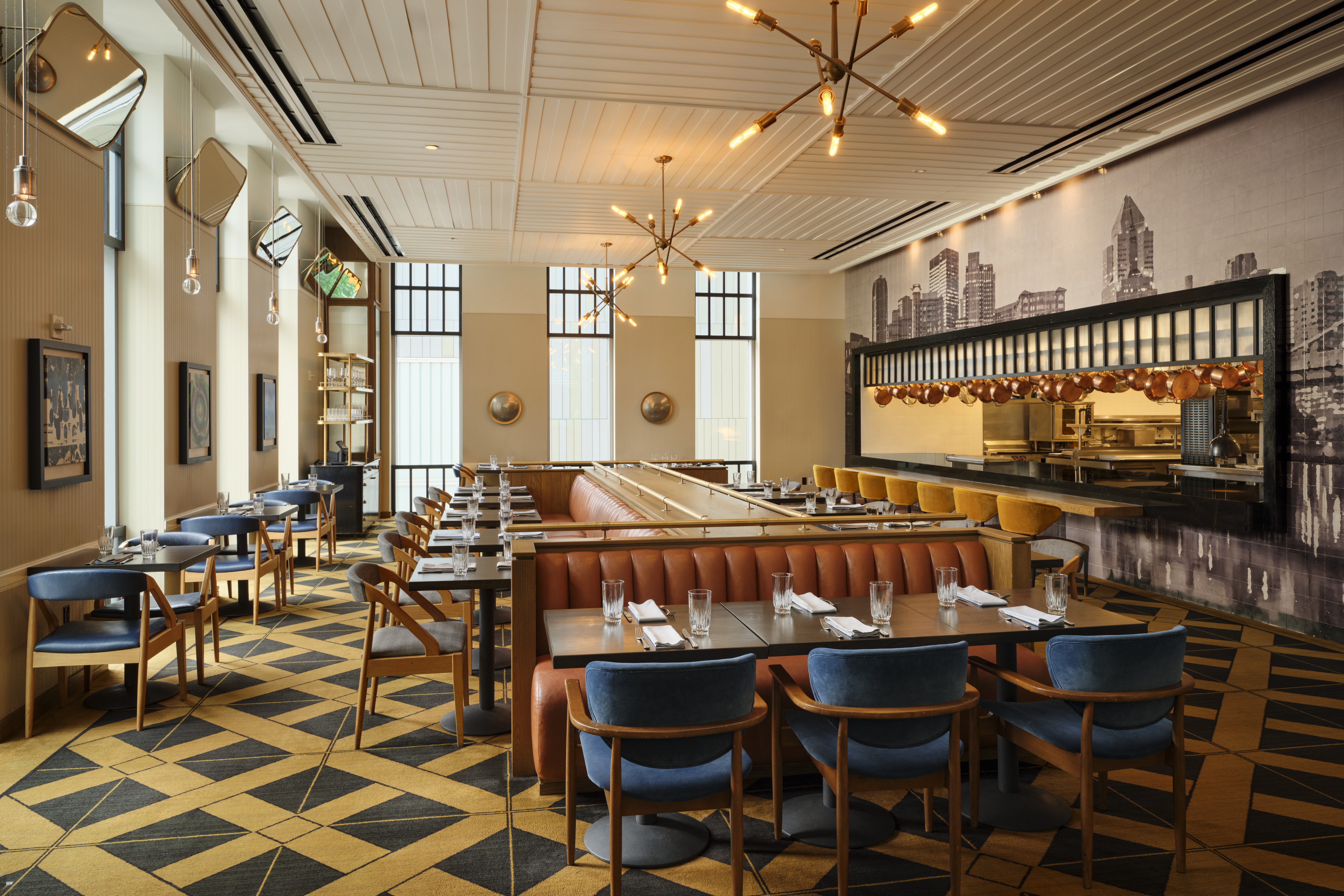a restaurant with tables and chairs