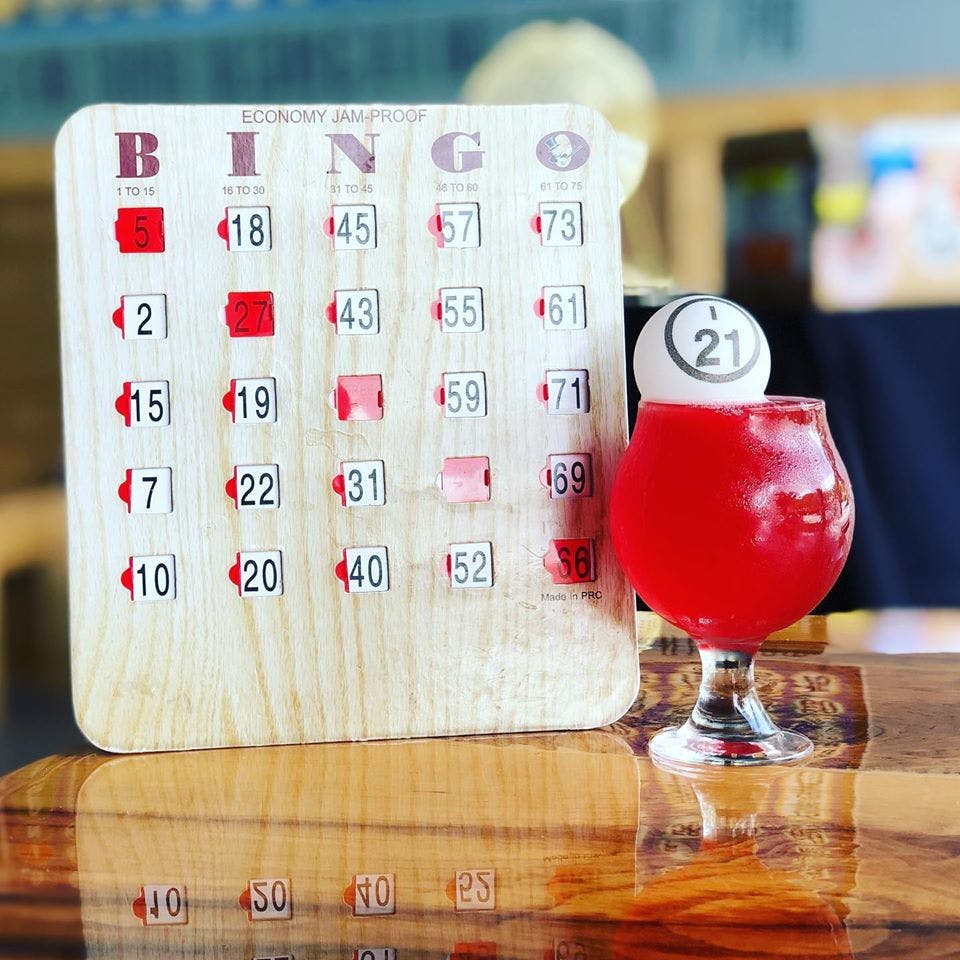 an image of a bingo board next to a beverage