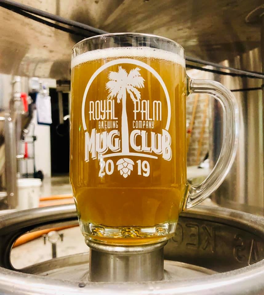 a close up of a big glass of beer