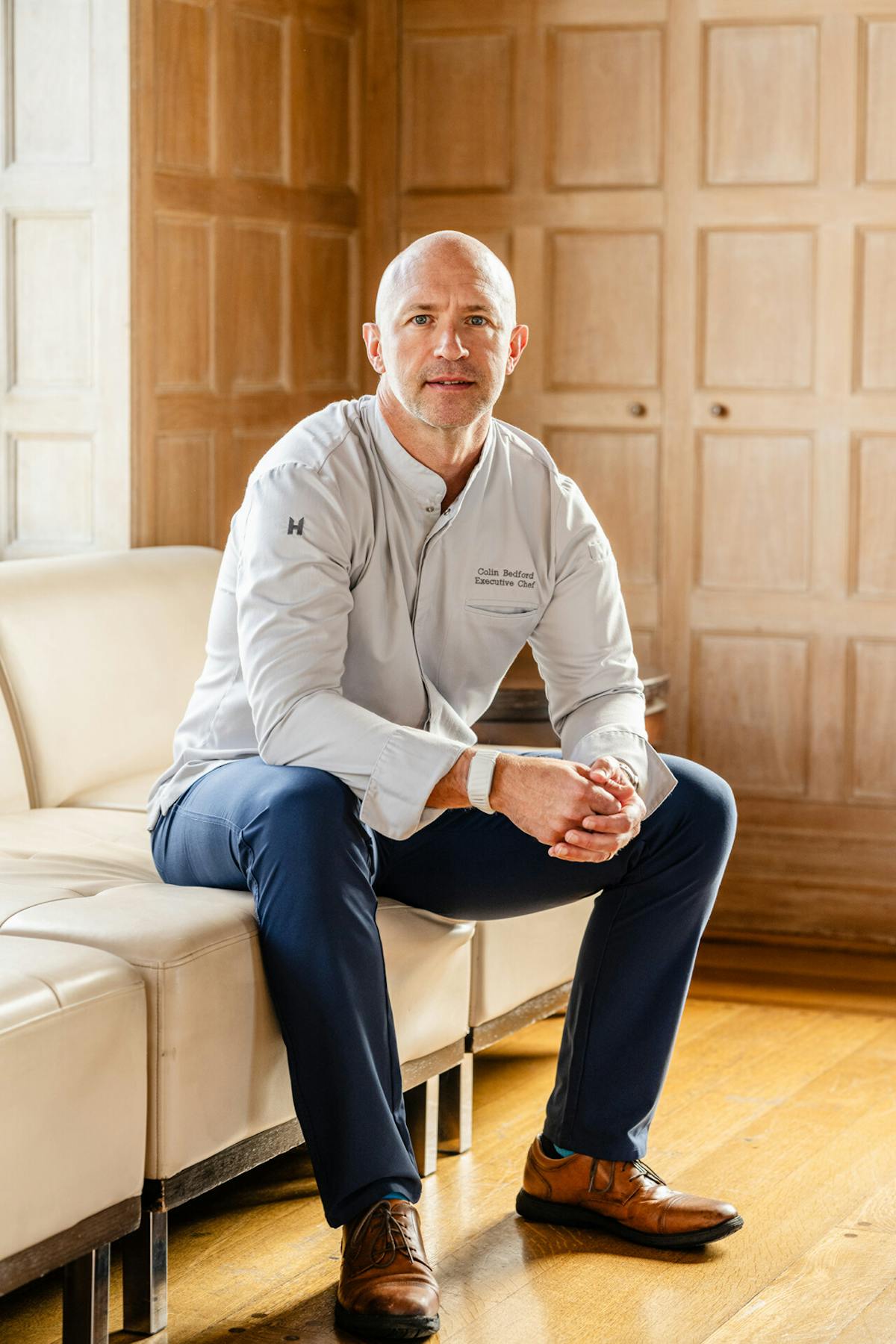 Chef Colin Bedford sitting on a chair