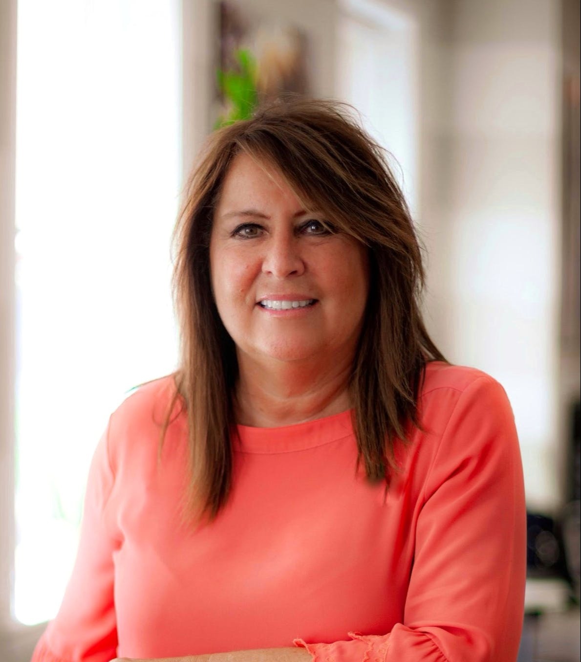 a woman in a pink shirt