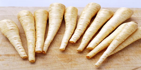 Fresh Cut Parsnips on Cutting Board
