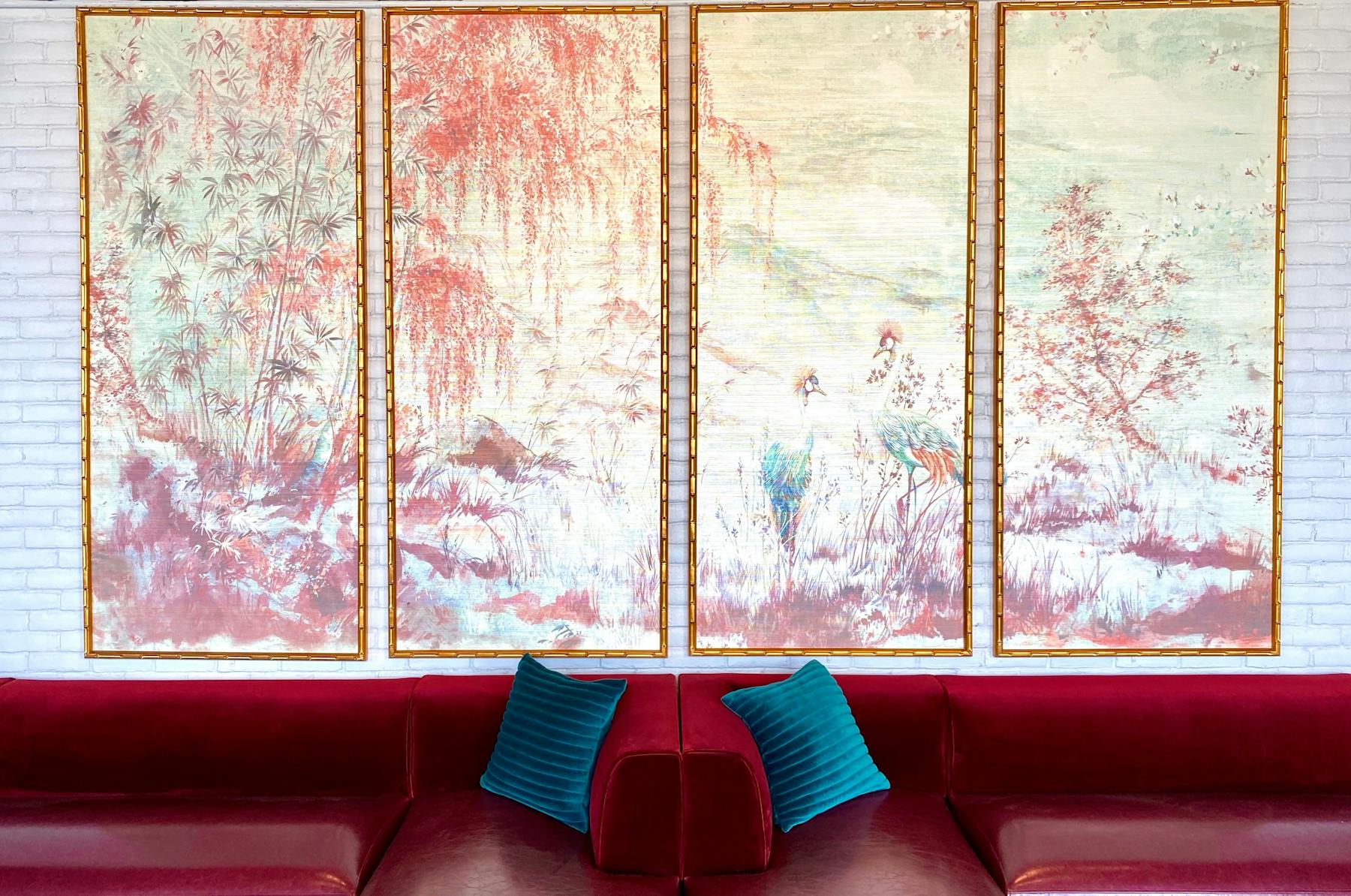 a colorful living room with a large window
