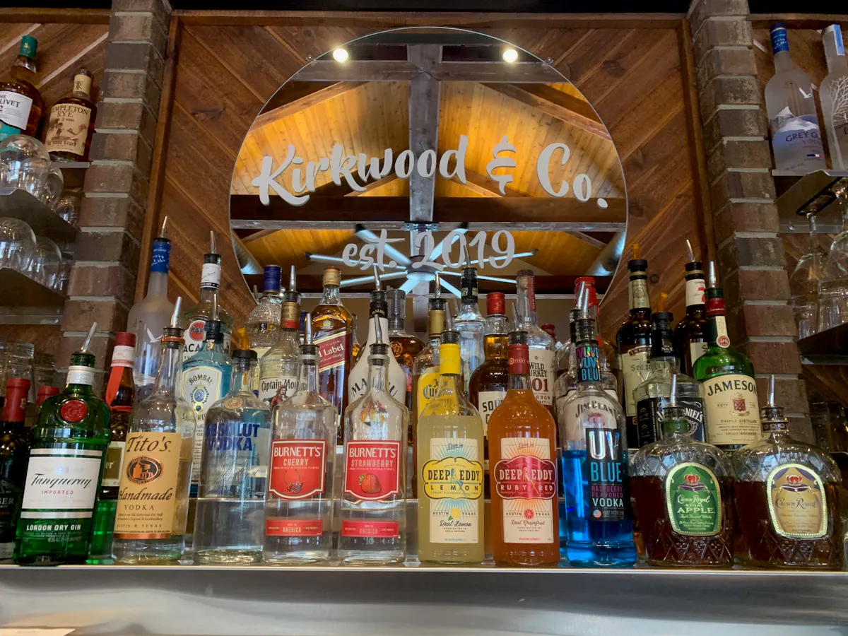 a bottle of wine in front of a store