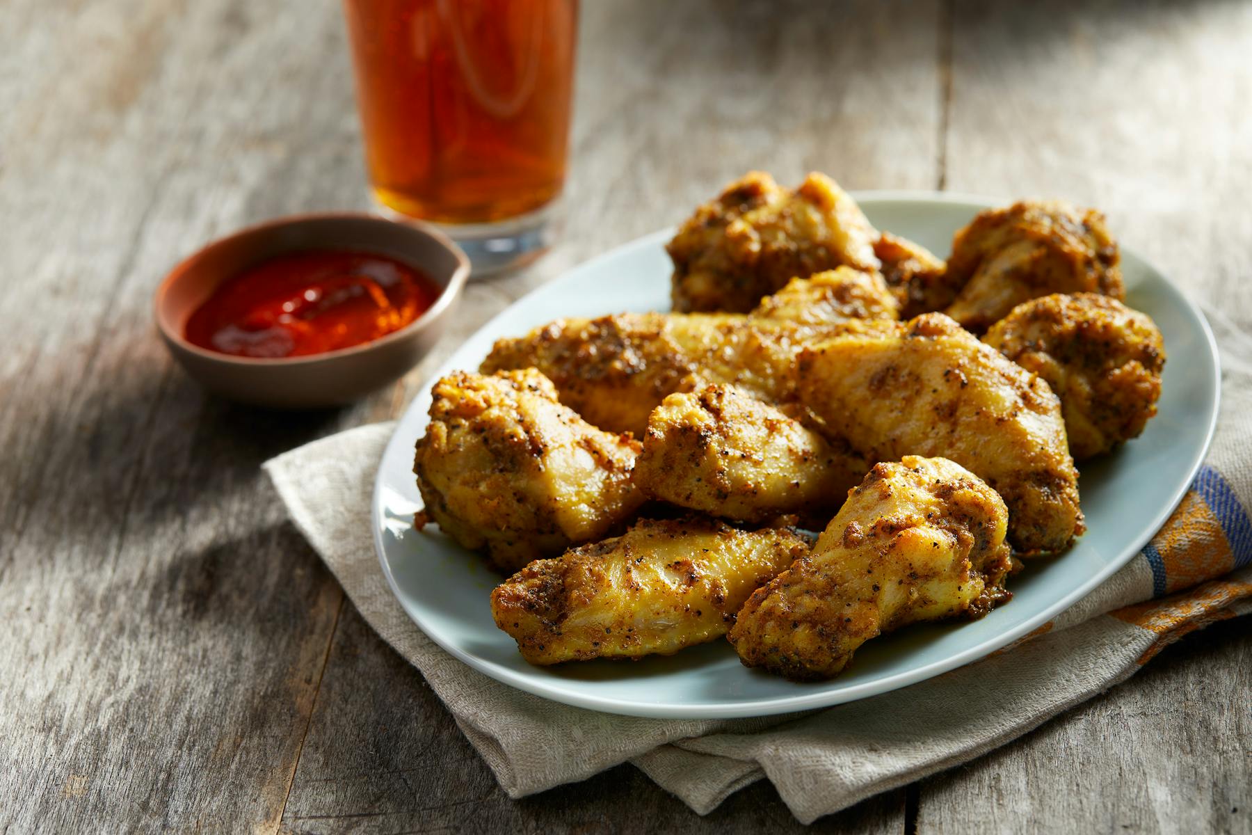 a plate of chicken wings