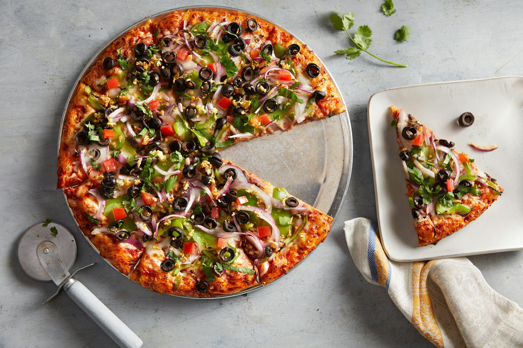 a pizza sitting on top of a table